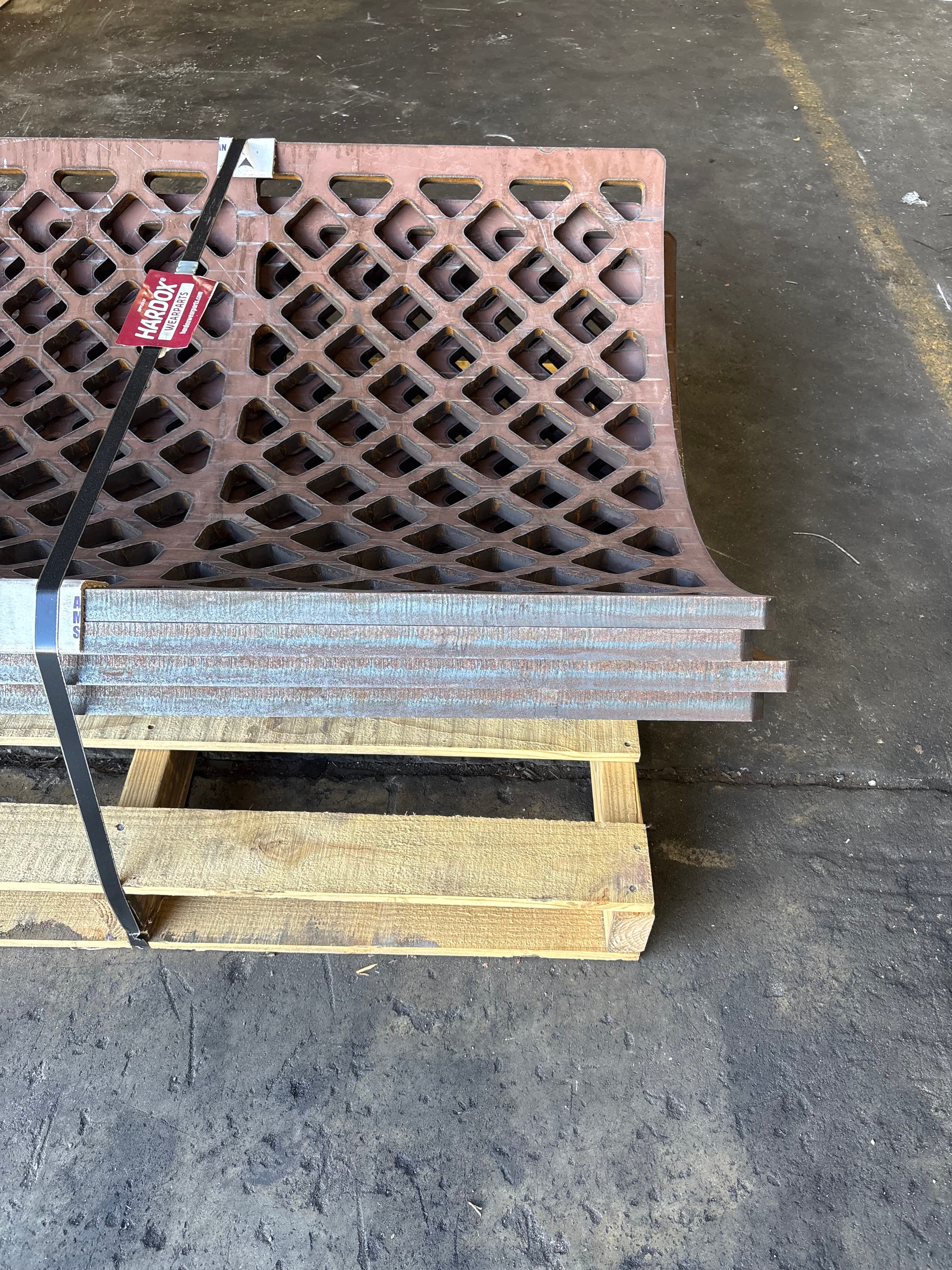 Diamond-hole grinder screens on a pallet